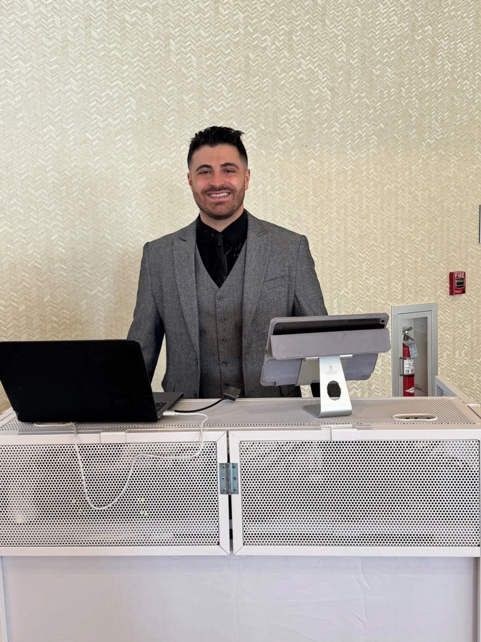 Michael Rossi, owner and DJ of MJR Entertainment, smiling for a professional portrait